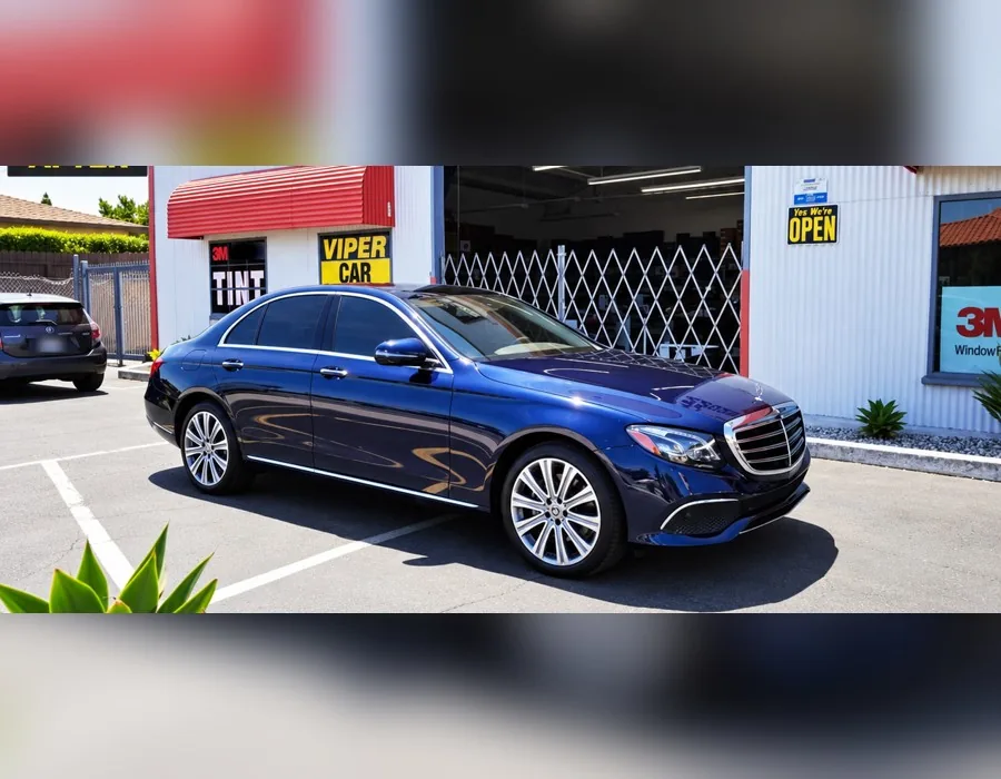 Blue Mercedes-Benz E-Class with window tint